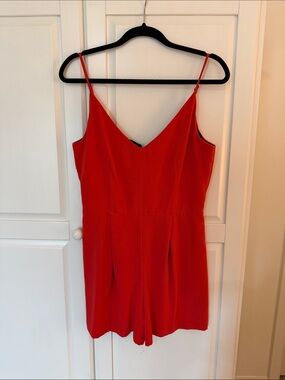 BEBE Orange/red Spaghetti Strap Romper